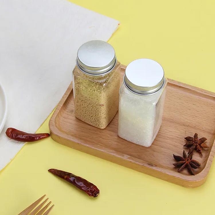 Wholesale clear 100ml plastic shaker bottles for spices with aluminum lids
